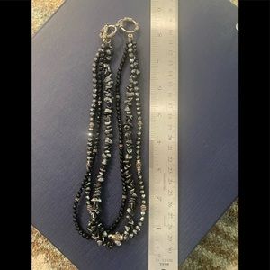 Black gemstone layered necklace with silver accents